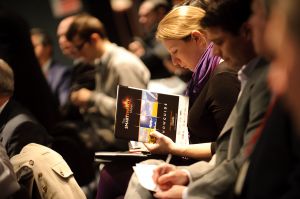 Photograph of a delegate at a trade conference